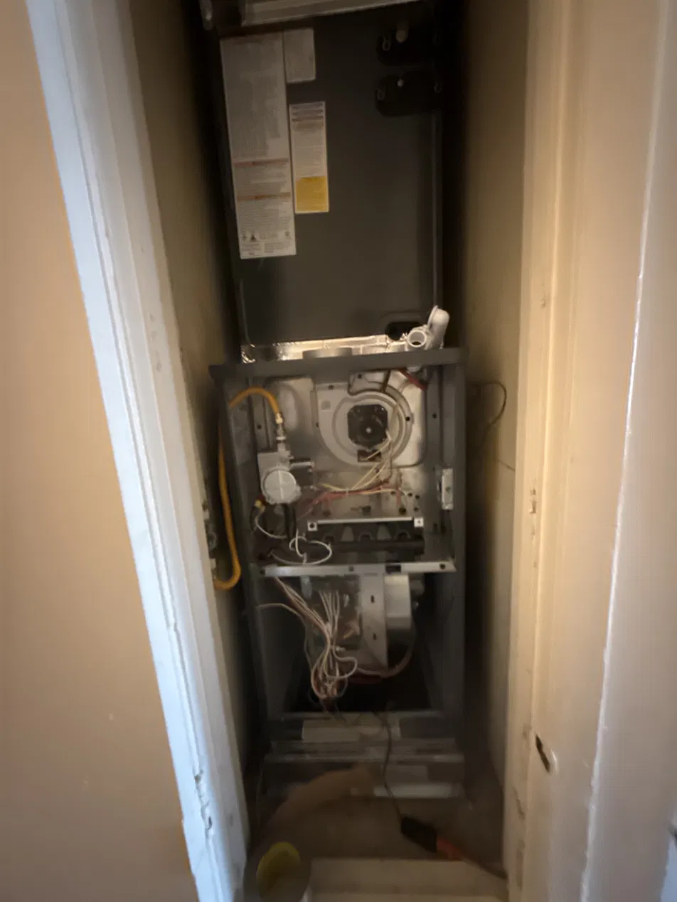 Gas furnace opened for blower or inducer motor repair in Shreveport, Louisiana