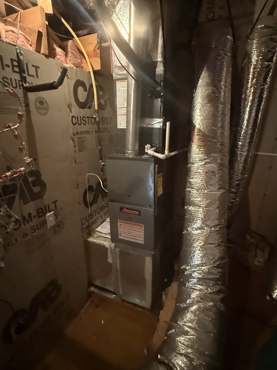 Amana gas furnace installed in an attic or utility area in Shreveport, Louisiana